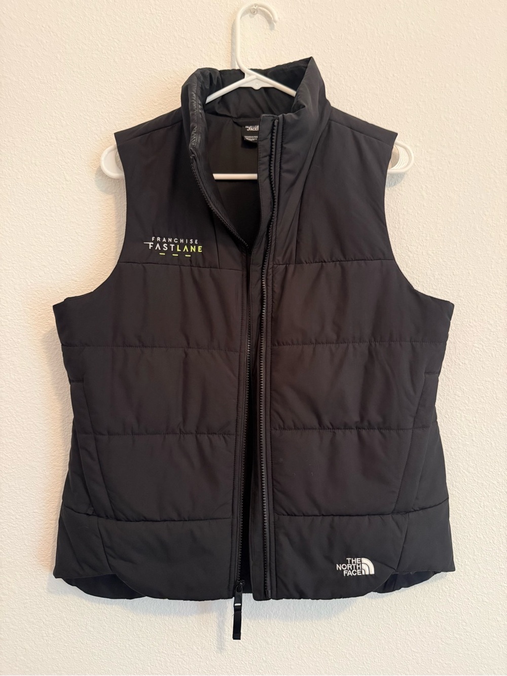 The North Face Black Quilted Sleeveless Vest with Fastlane Accent